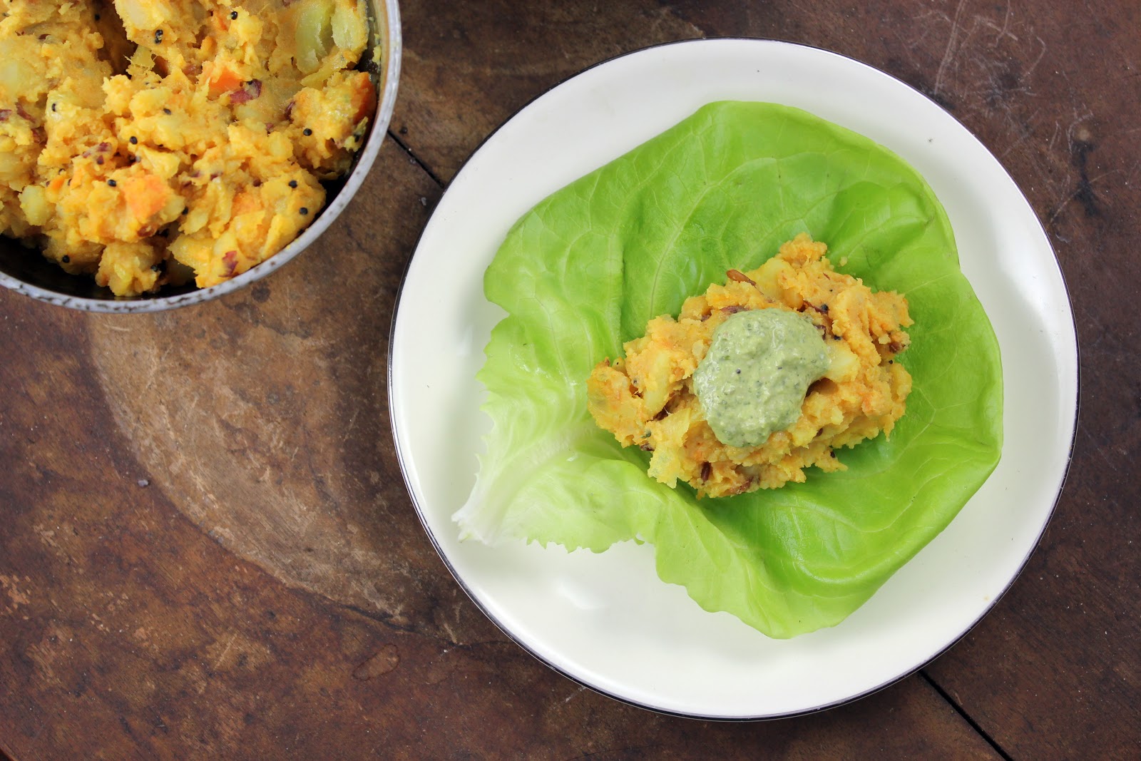 assembled lettuce dosa with potato curry, coconut chutney